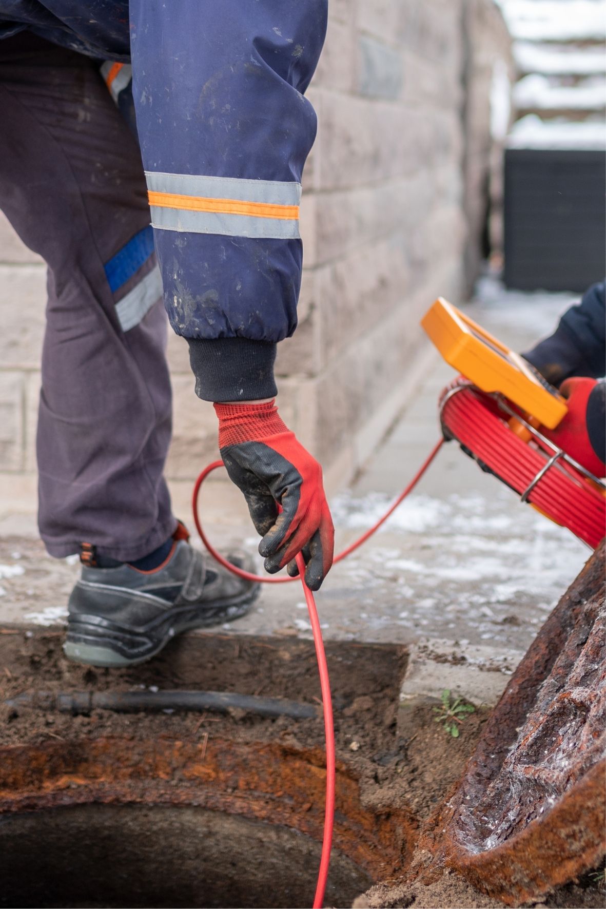 Nettoyage de drain et accès à un regard de drainage au sol dans la Capitale-Nationale